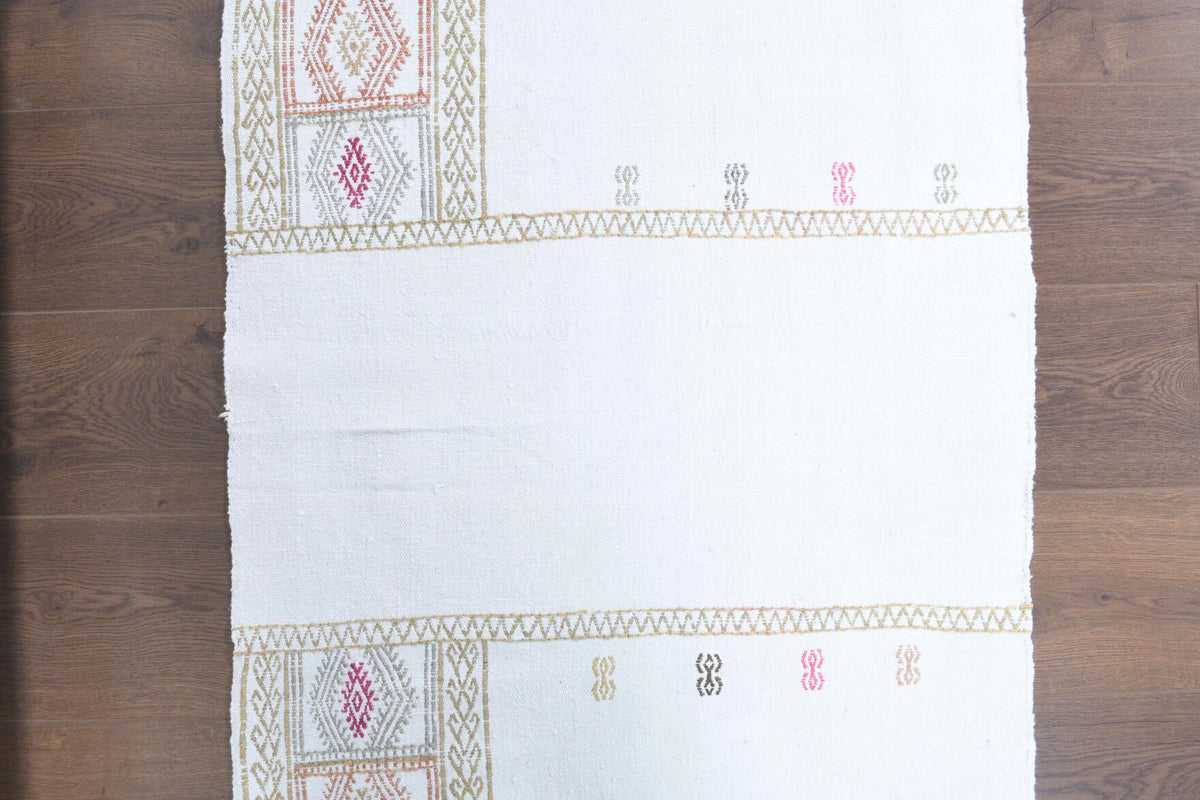 El yapımı vintage yolluk 74x211 cm düz desenli yün - kenar ve saçak detayı