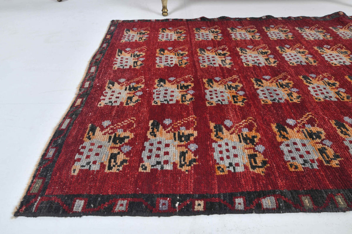 El yapımı vintage halı 91x152 cm i̇kat desenli yün - yakın çekim doku detayı