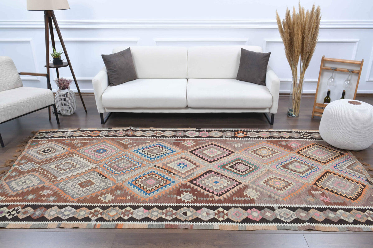 El yapımı vintage yolluk 155x320 cm geometrik desenli yün - ışık altında renk detayı