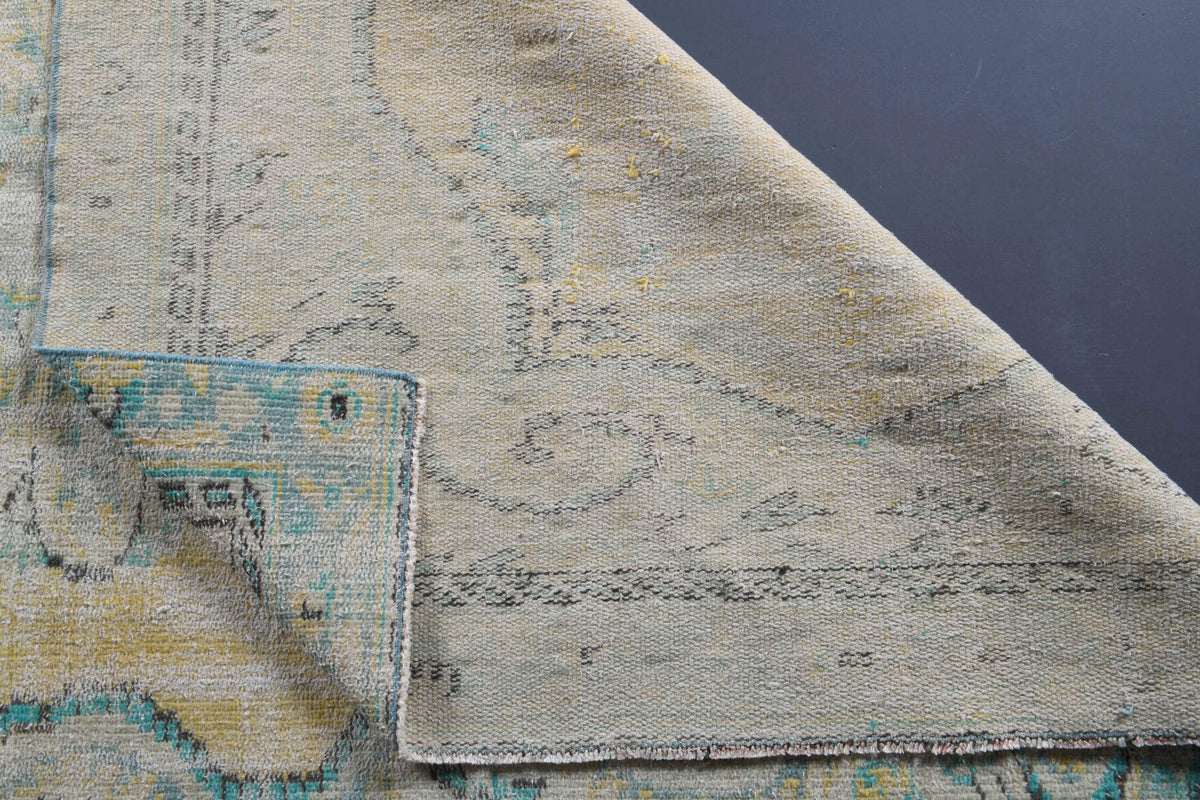 El yapımı vintage halı 152x244 cm oryantal desenli yün - yakın çekim doku detayı