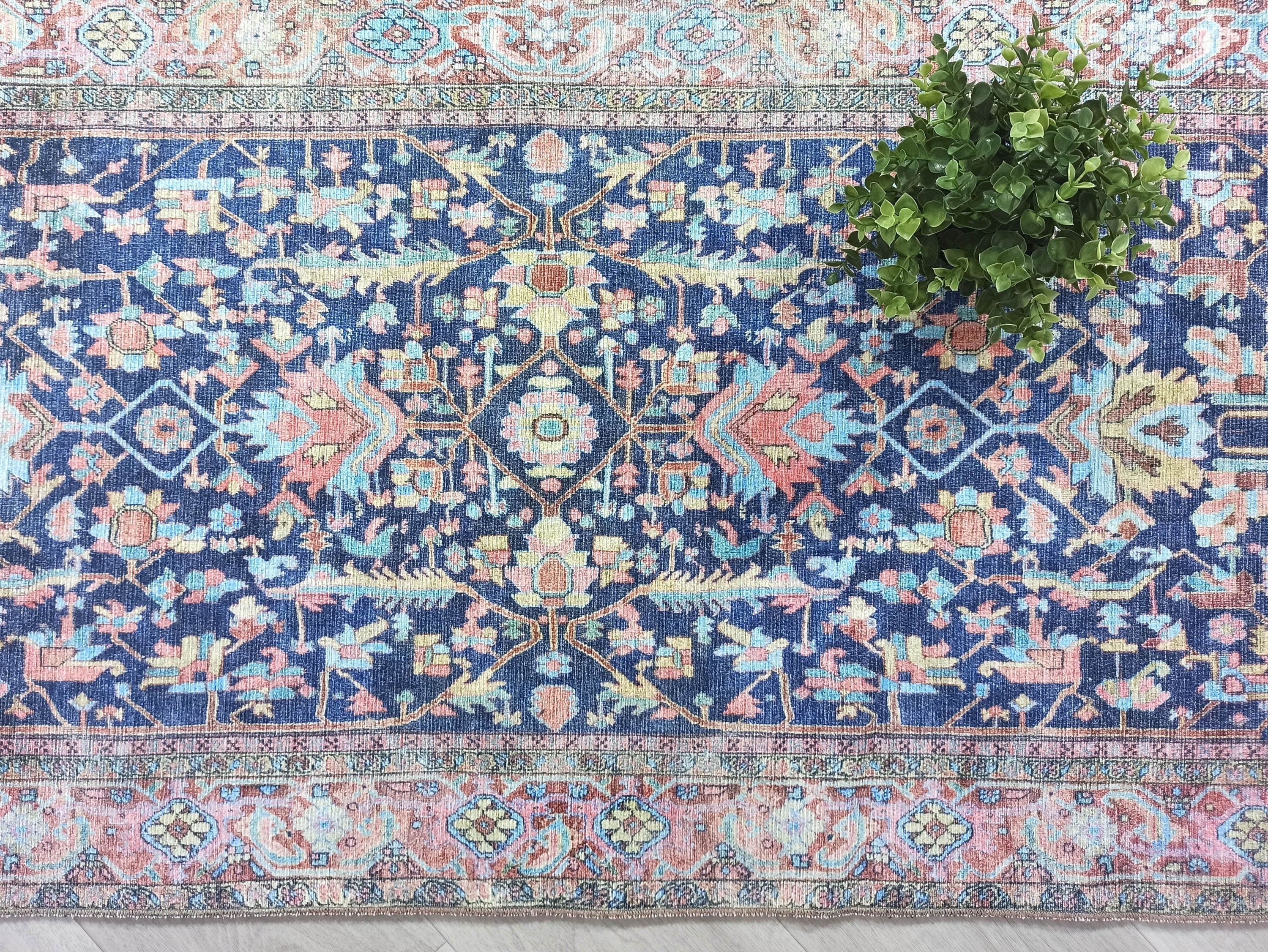 Lacivert ve Somon Çiçekli Vintage Türk Halısı