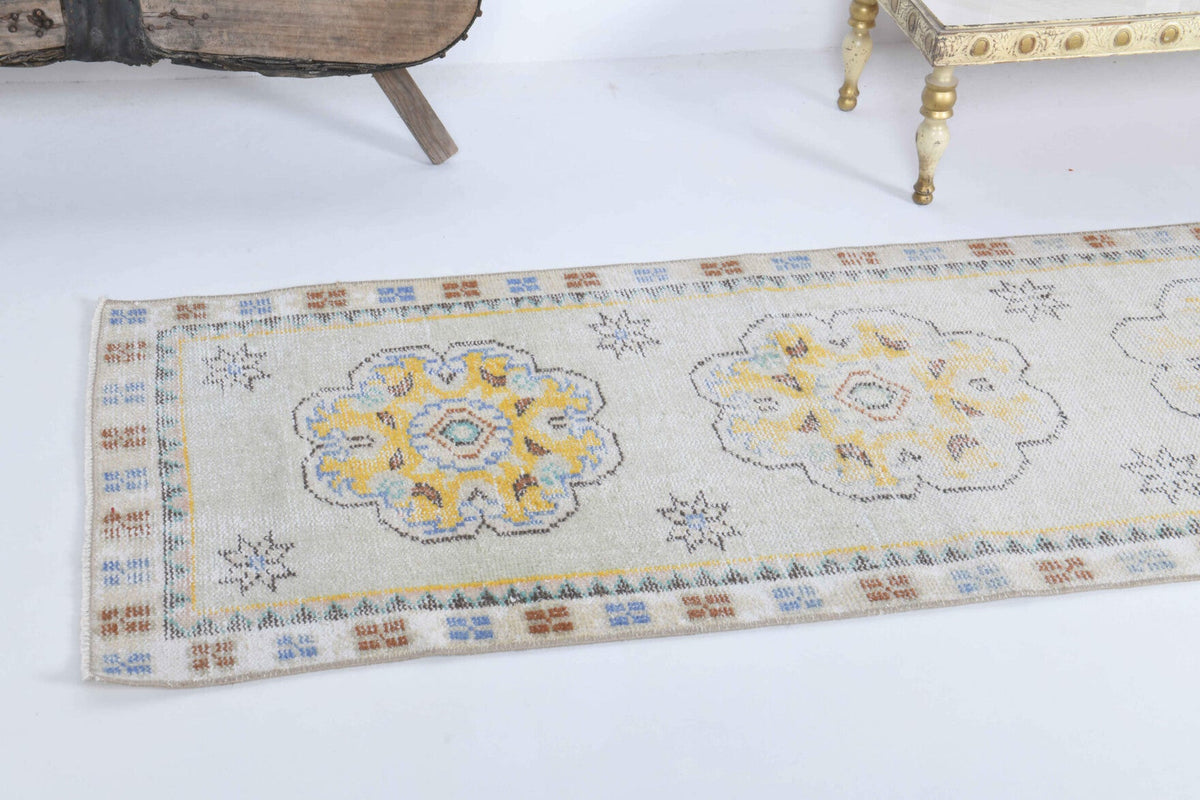 El yapımı vintage yolluk 71x338 cm oryantal desenli yün - yakın çekim doku detayı