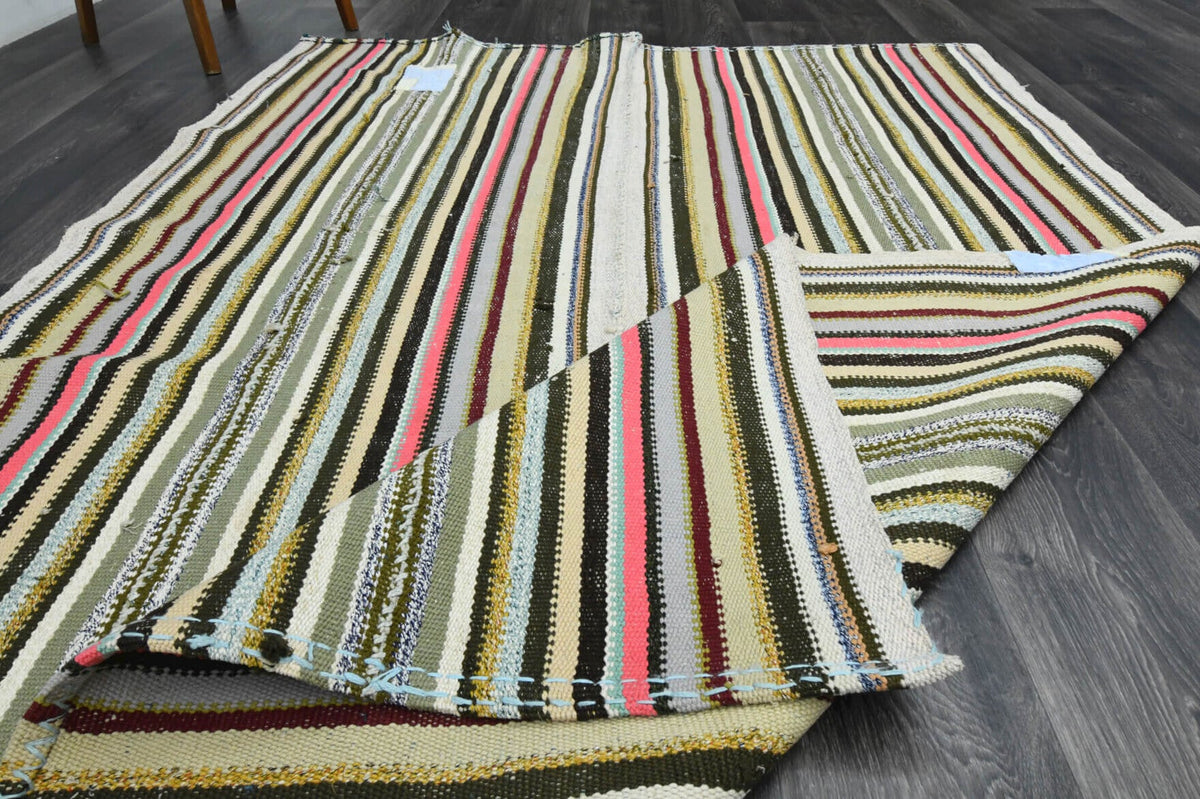 El yapımı vintage halı 163x231 cm oryantal desenli yün - ışık altında renk detayı