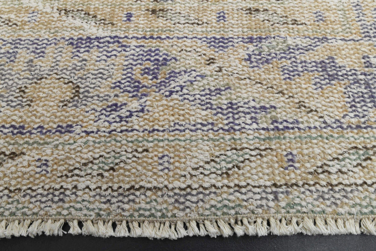 El yapımı vintage halı 152x244 cm oryantal desenli yün - yakın çekim doku detayı