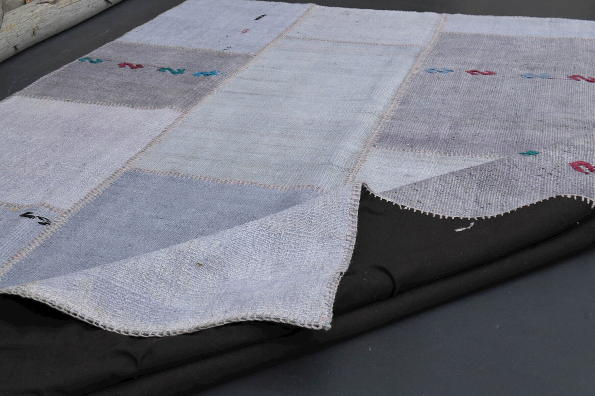 El yapımı vintage halı 196x302 cm düz desenli yün - ışık altında renk detayı