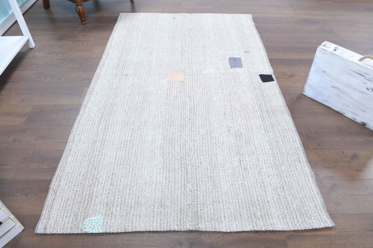 El yapımı vintage halı 135x226 cm düz desenli yün - yakın çekim doku detayı