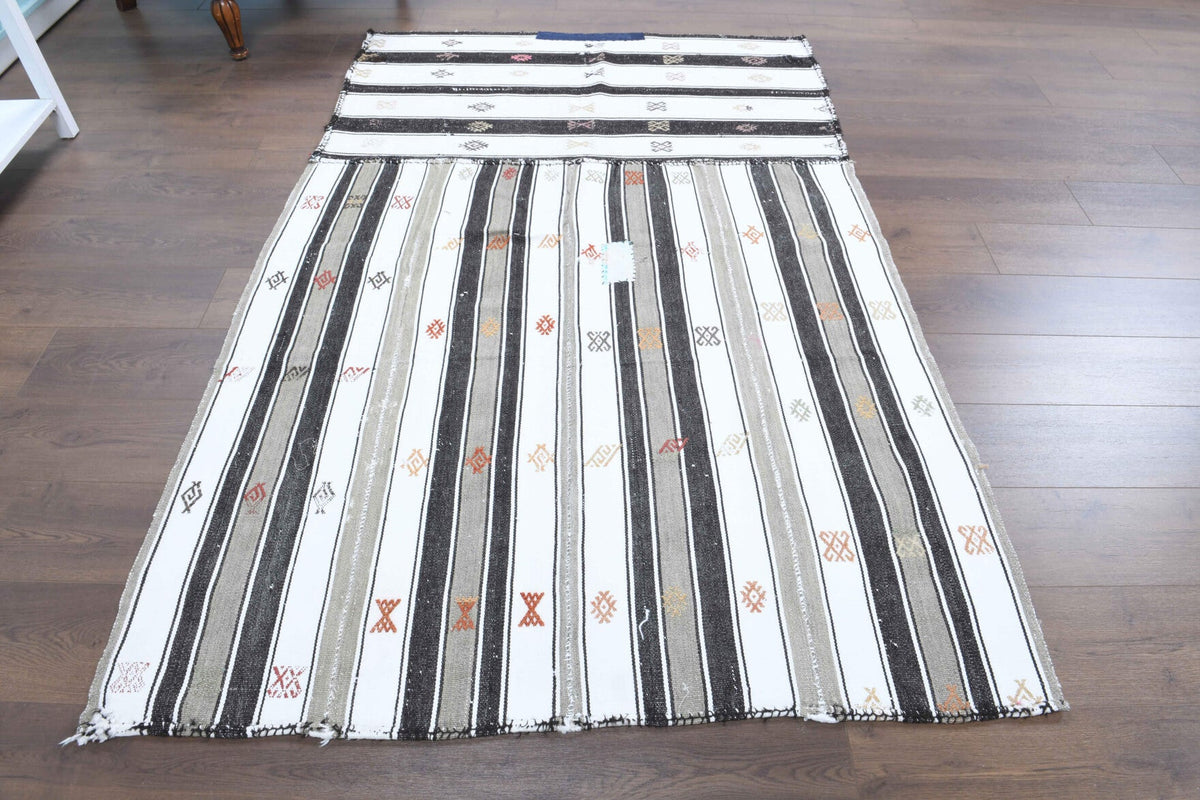 El yapımı vintage halı 140x213 cm çizgili desenli yün - yakın çekim doku detayı