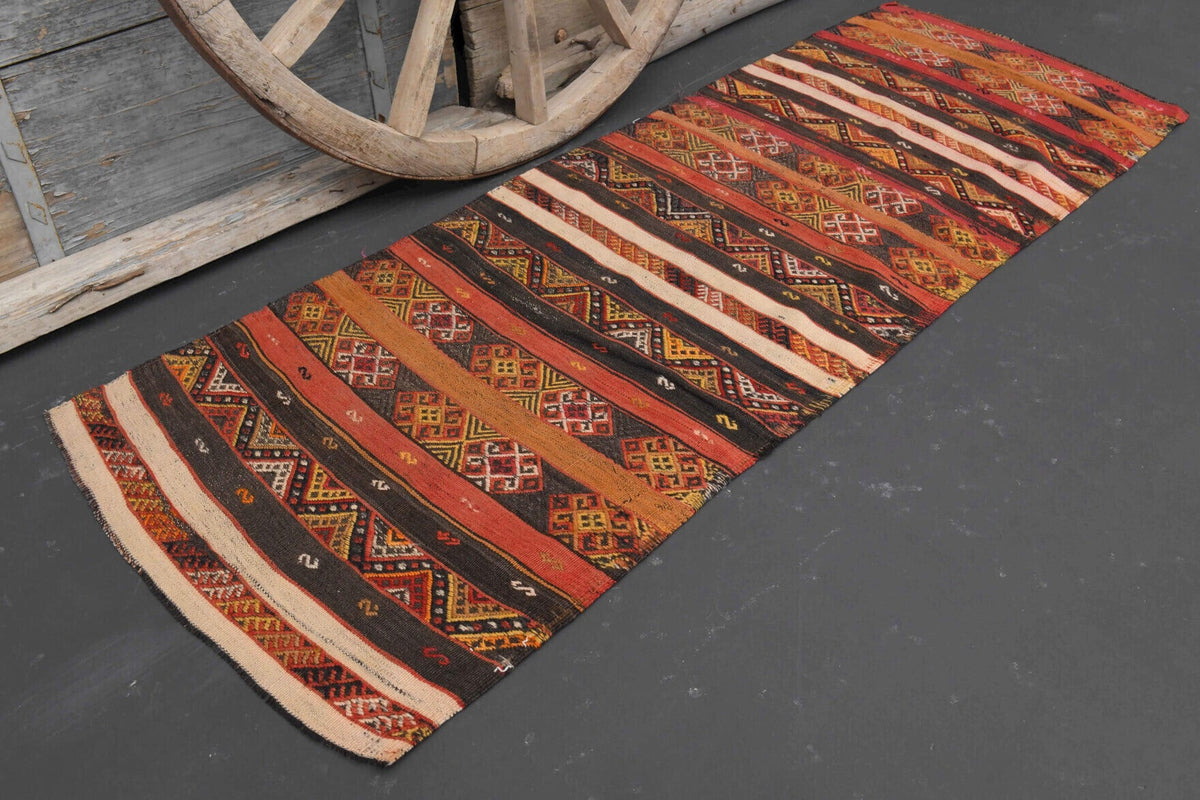 El yapımı vintage halı 74x203 cm i̇kat desenli yün - yakın çekim doku detayı