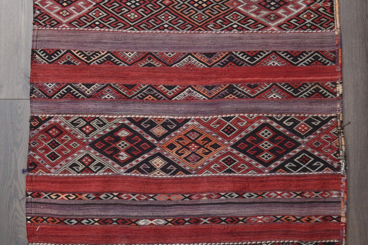 El yapımı vintage yolluk 86x307 cm oryantal desenli yün - ışık altında renk detayı