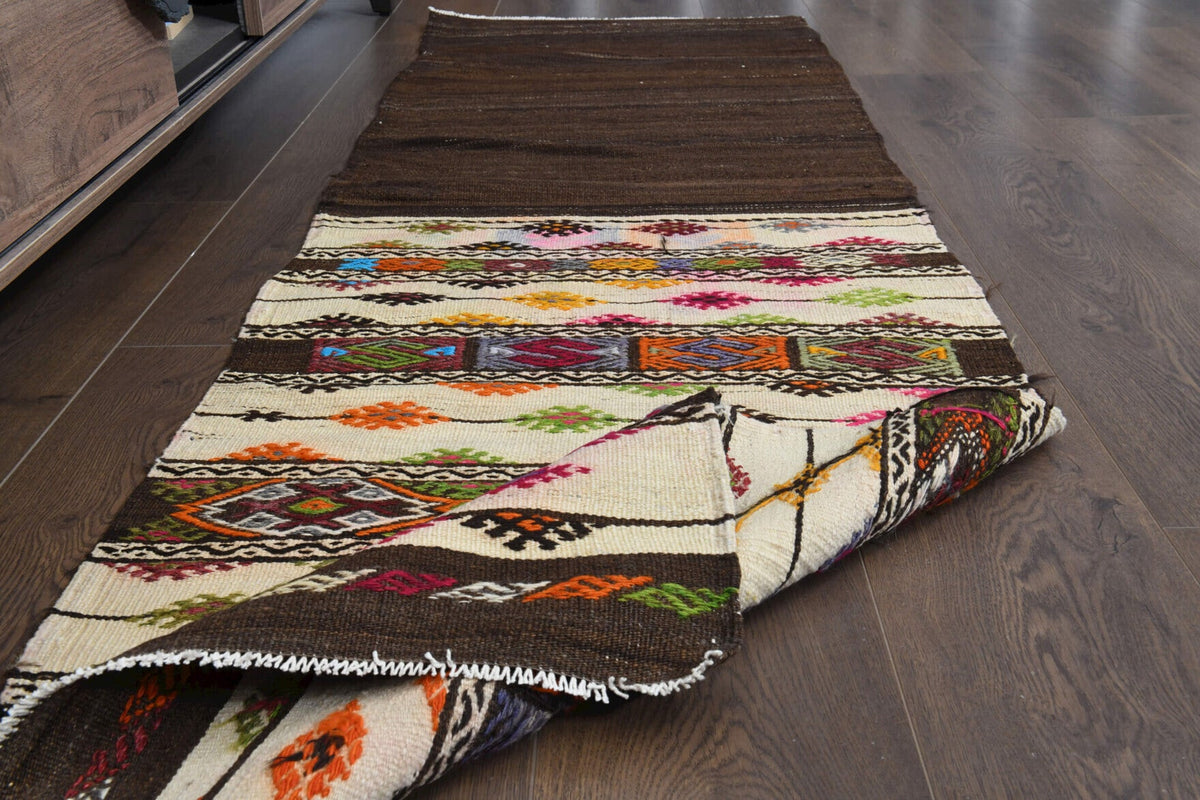 El yapımı vintage yolluk 64x211 cm oryantal desenli yün - ışık altında renk detayı