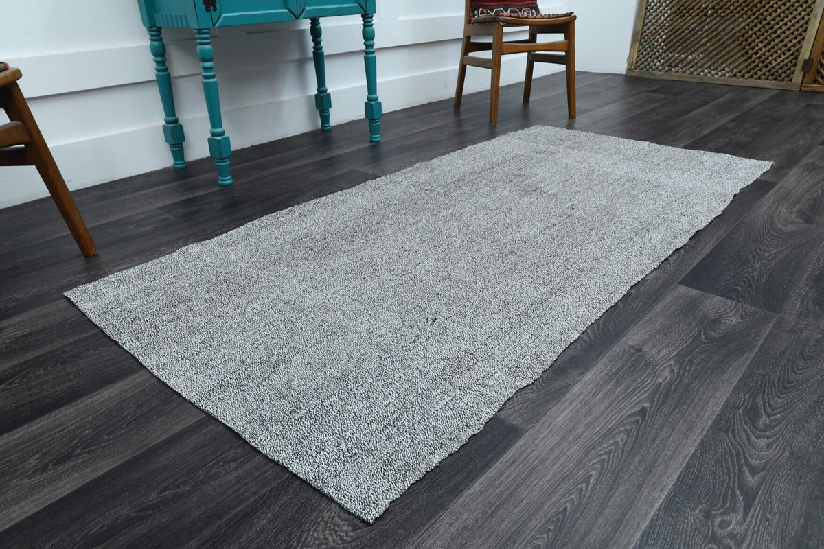 El yapımı vintage yolluk 97x201 cm düz desenli yün - yakın çekim doku detayı