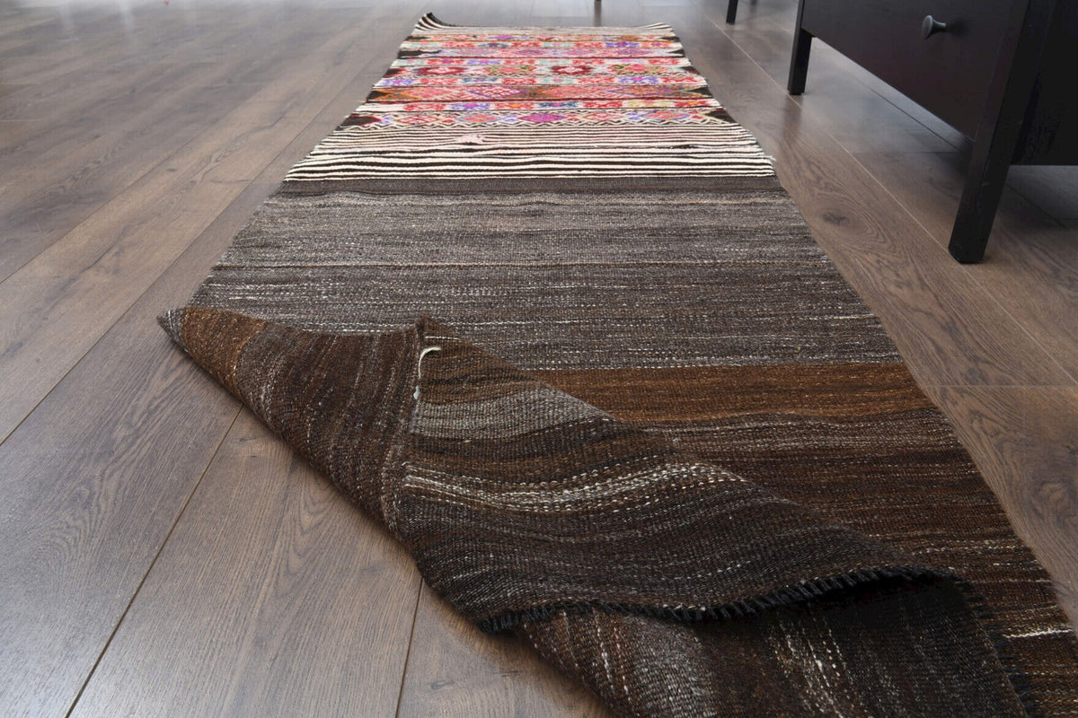 El yapımı vintage halı 76x254 cm geometrik desenli yün - yakın çekim doku detayı