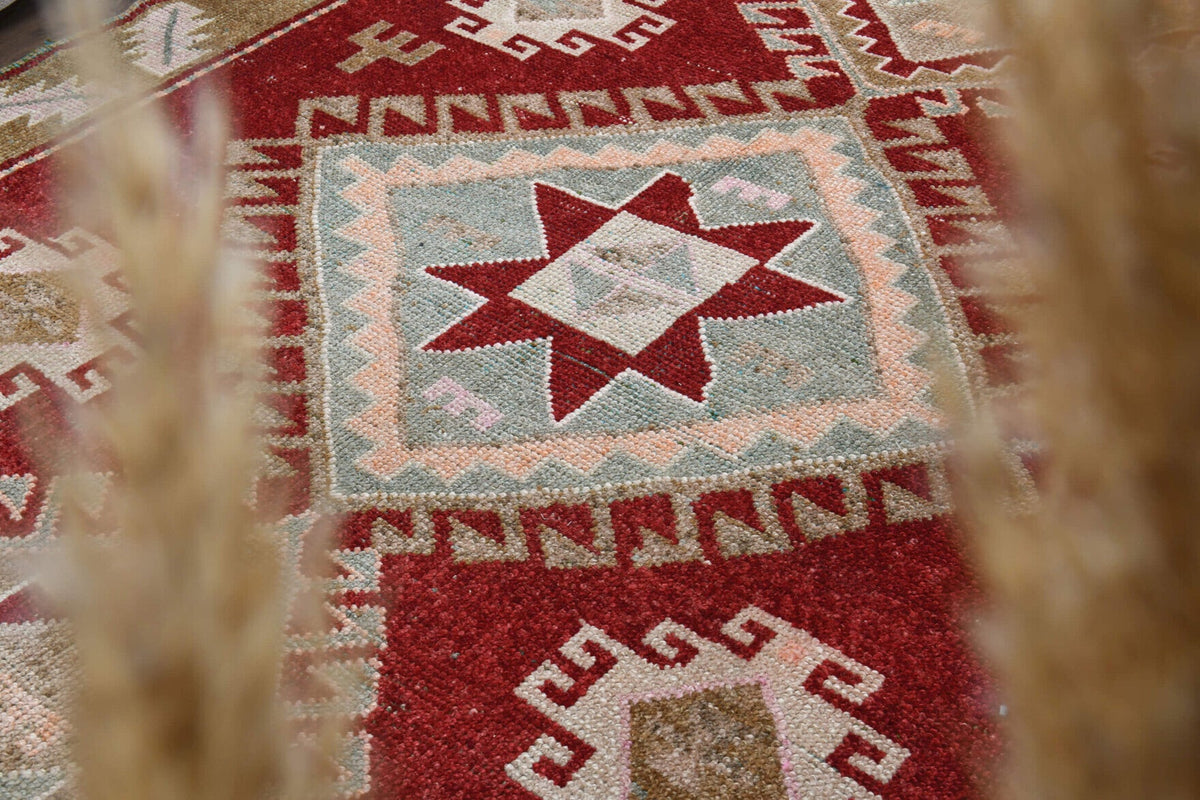 El yapımı vintage yolluk 178x427 cm geometrik desenli yün - yakın çekim doku detayı