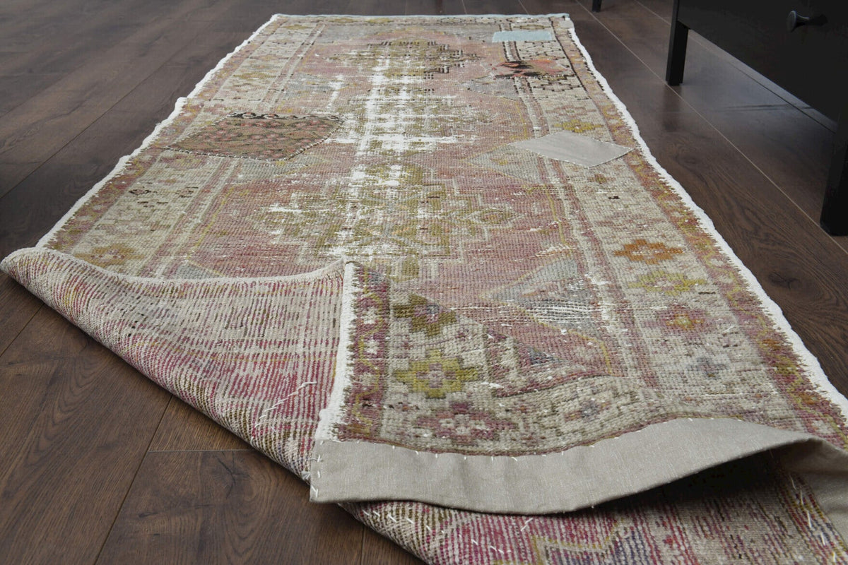 El yapımı vintage yolluk 89x274 cm oryantal desenli yün - yakın çekim doku detayı