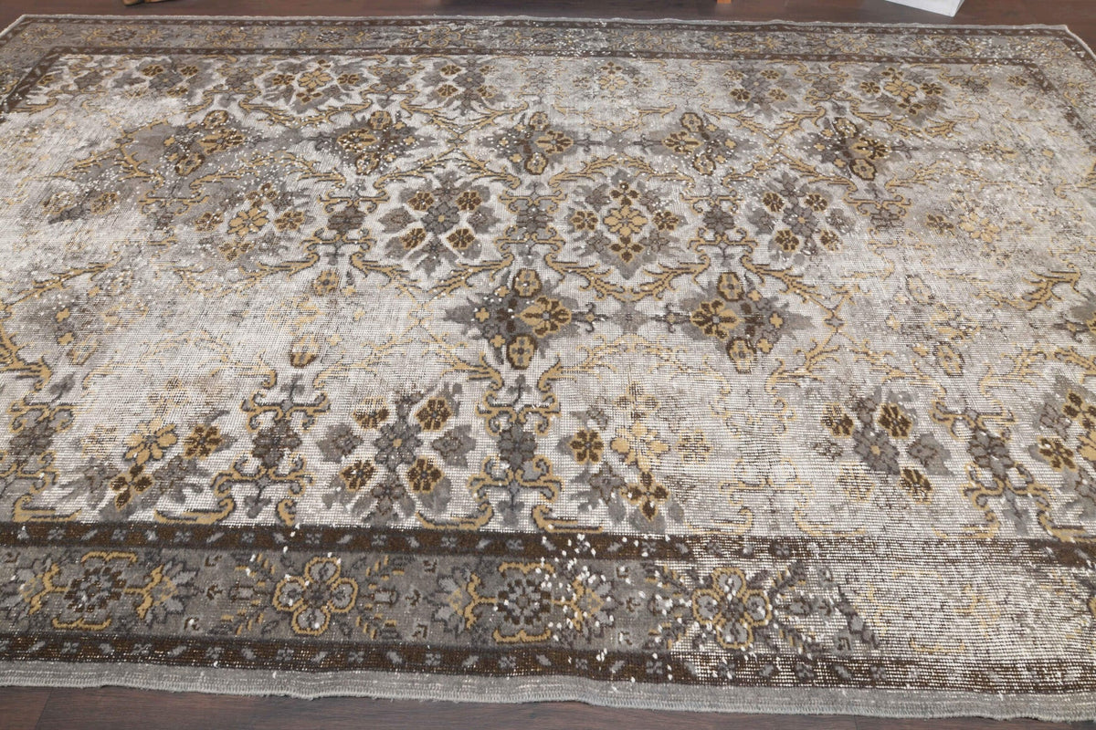 1960s Distressed Vintage Hereke Area Rug