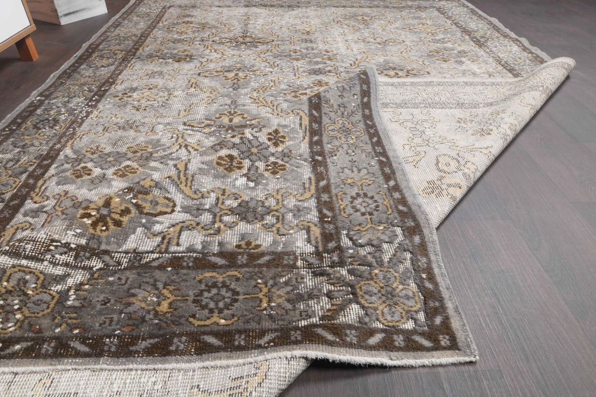 1960s Distressed Vintage Hereke Area Rug