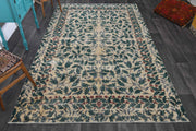 1970'lerden Anadolu kökenli çiçek desenli el dokuma vintage halı, 199x326 cm