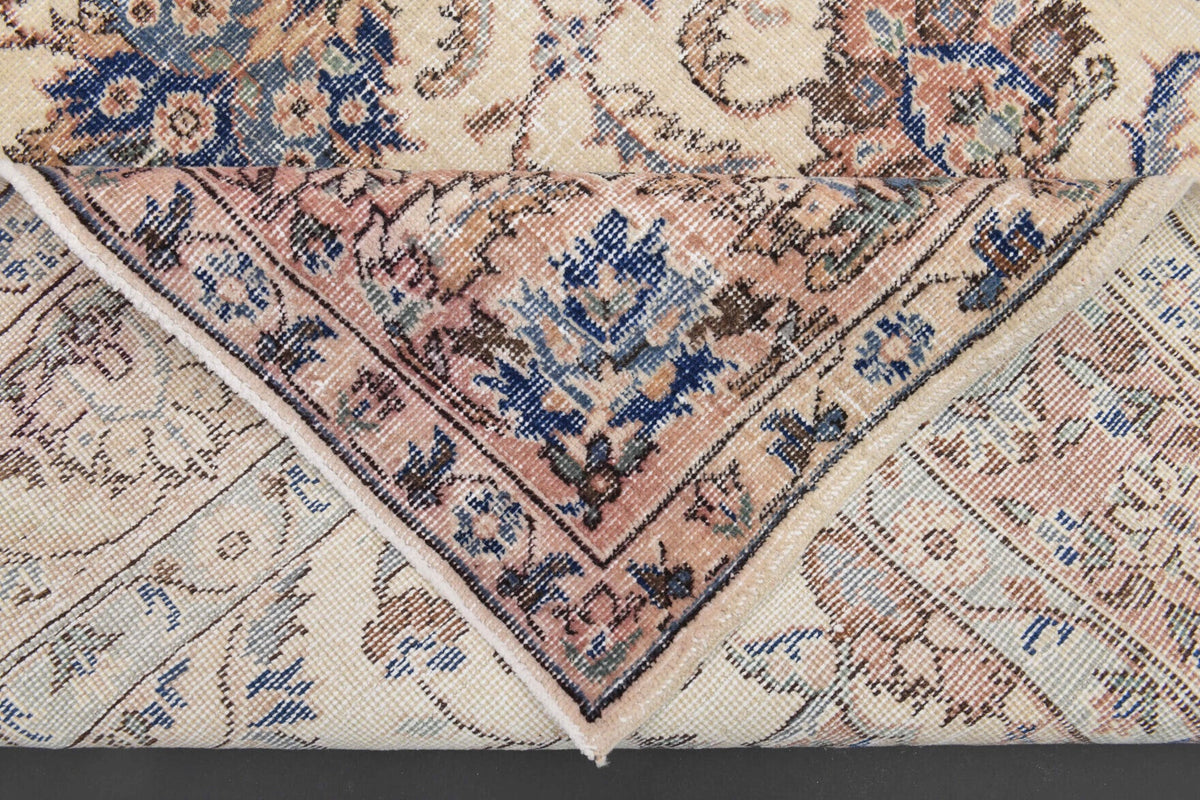 El yapımı vintage halı 198x323 cm oryantal desenli yün - ışık altında renk detayı