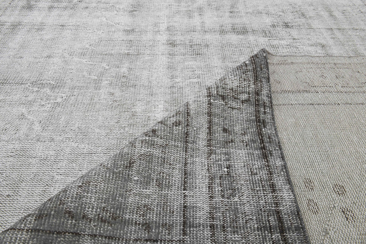 El yapımı vintage halı 183x274 cm düz desenli yün - ışık altında renk detayı