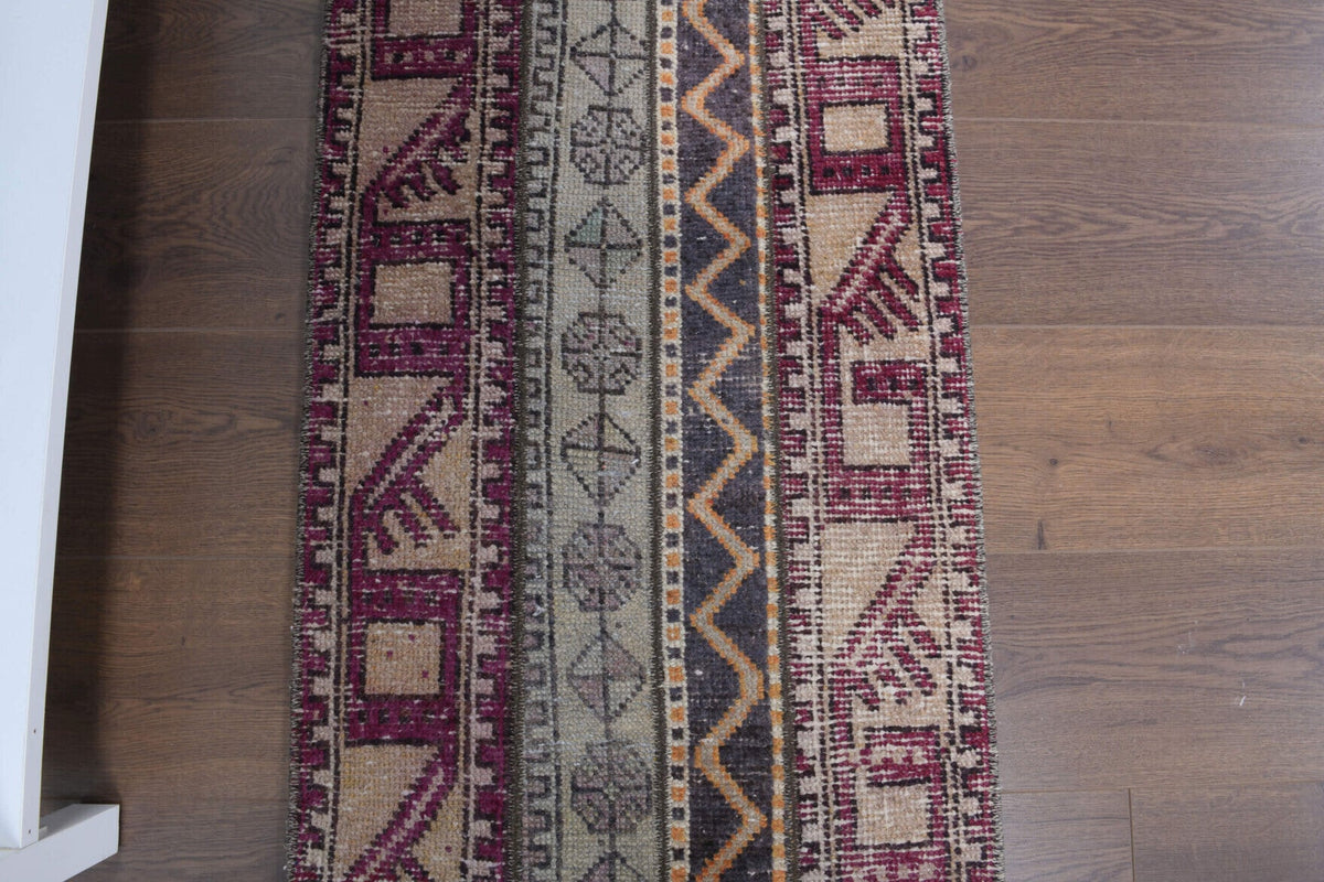 El yapımı vintage halı 56x150 cm oryantal desenli yün - yakın çekim doku detayı