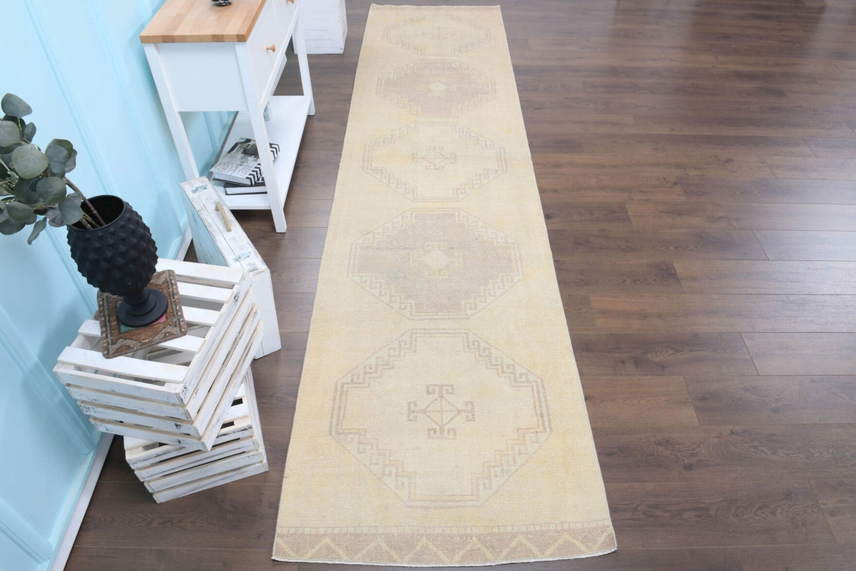El yapımı vintage yolluk 91x381 cm geometrik desenli yün - yakın çekim doku detayı