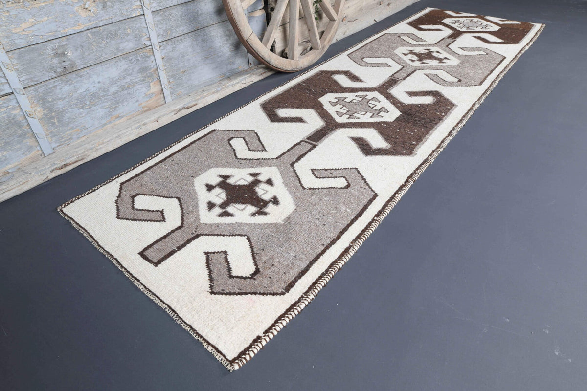 El yapımı vintage yolluk 102x361 cm tribal desenli yün - yakın çekim doku detayı