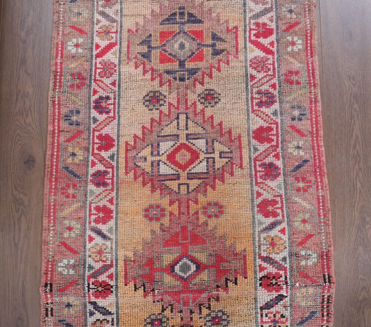El yapımı vintage yolluk 81x381 cm oryantal desenli yün - yakın çekim doku detayı