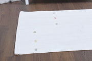 El yapımı vintage halı 64x117 cm düz desenli yün - detay görünümü